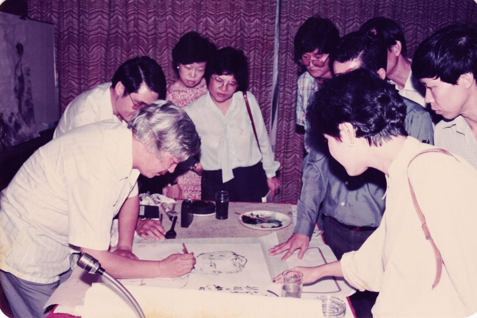 Artist(name), far left, Wong Soo Yen, far back.  Learning techniques with classmates