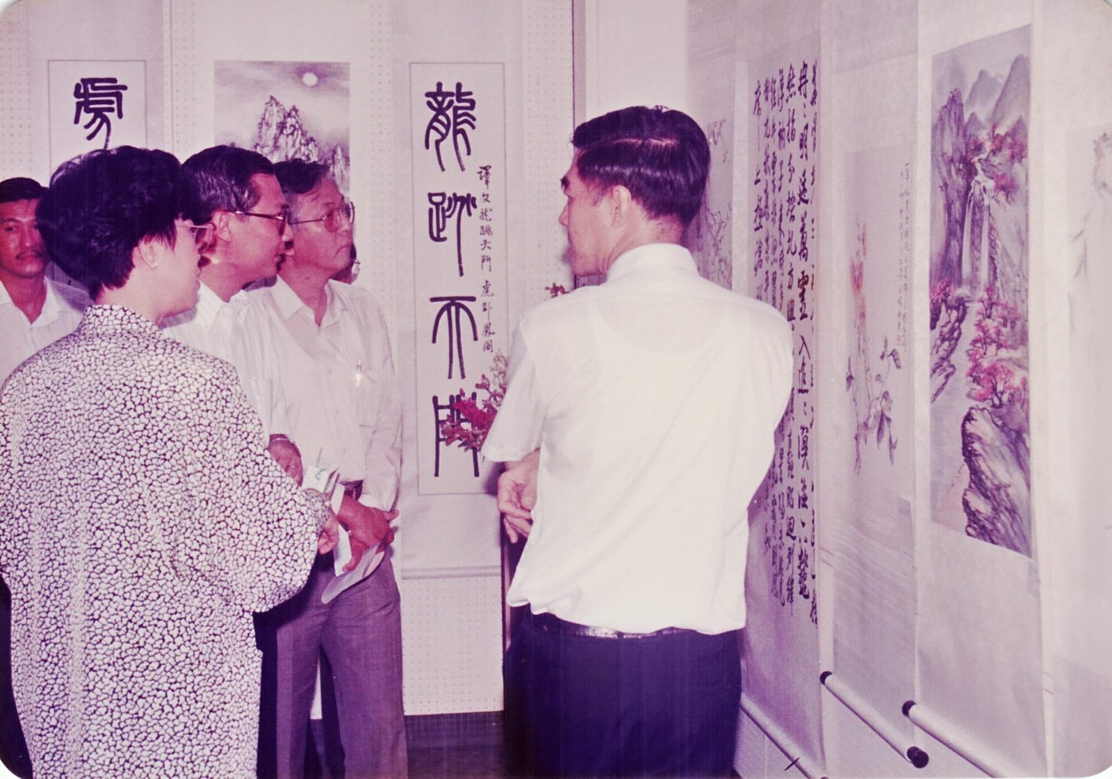 Wong Soo Yen introducing her art to Ch_ng Jit Koon, 2nd from right, Senior Minister of State for Community Development Mar 1 1988